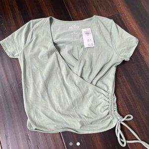 light green hollister baby tee 💚💚